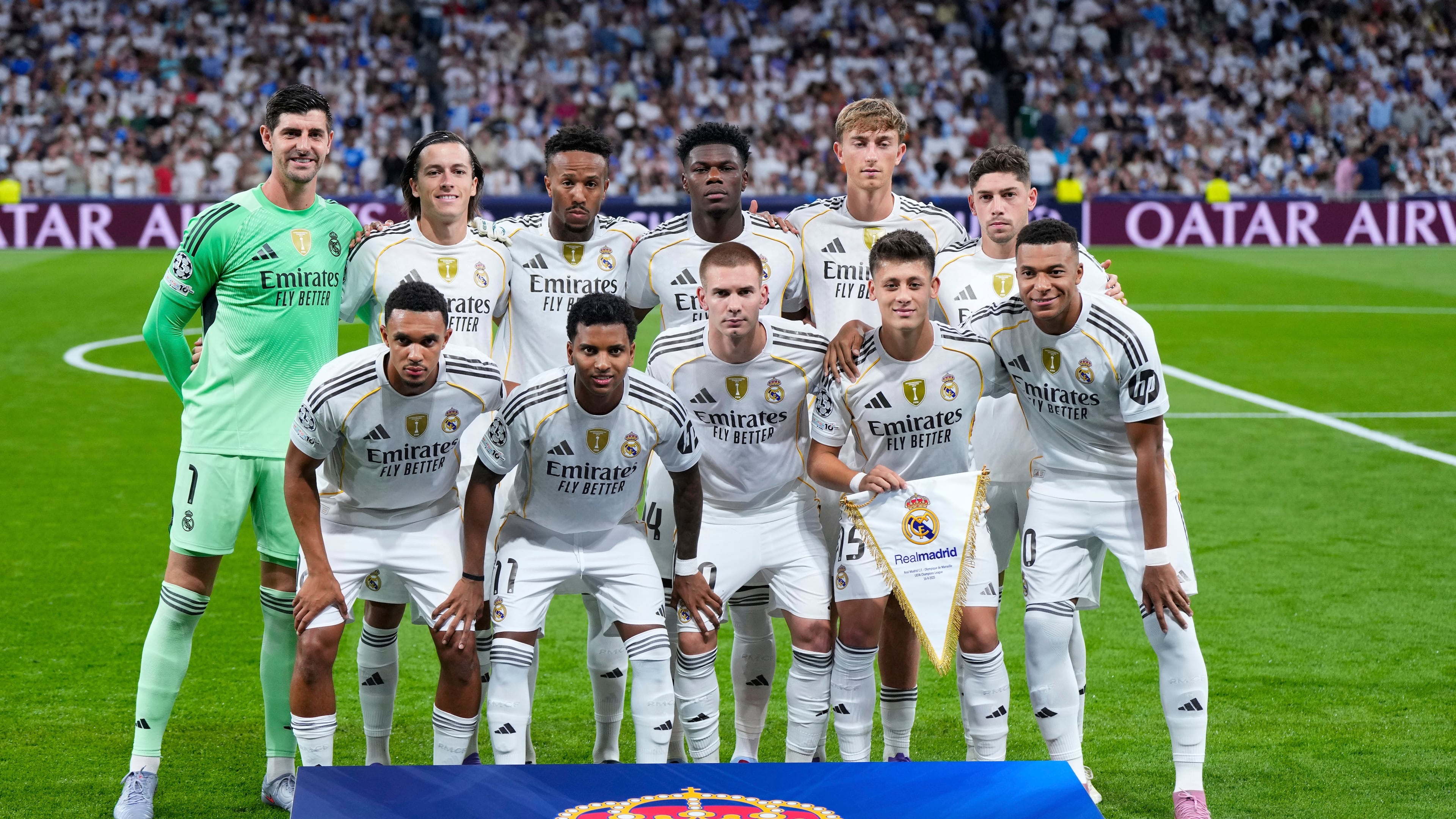 Real Madrid's players pose for photographers prior to a Champions League opening phase soccer match between Real Madrid and Marseille at Santiago Bernabeu stadium, in Madrid, Tuesday, Sept. 16, 2025. (AP Photo/Manu Fernandez)