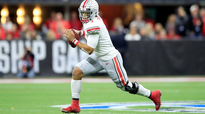 INDIANAPOLIS, INDIANA - DECEMBER 07: Justin Fields #1 of the Ohio State Buckeyes runs with the ball in the BIG Ten Football Championship Game against the Wisconsin Badgers at Lucas Oil Stadium on December 07, 2019 in Indianapolis, Indiana. (Photo by Andy Lyons/Getty Images)