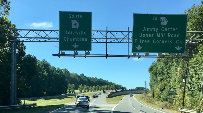GDOT contractors continue resurfacing on State Route 141/ Peachtree Industrial Boulevard in DeKalb and Gwinnett counties for resurfacing. (Photo by Karen Huppertz)
