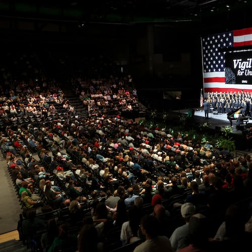 Hundreds attend a Vigil for Unity at the UCCU Center at Utah Valley University in Orem on Friday, Sept. 19, 2025. Charlie Kirk, conservative activist and the founder and president of Turning Point USA, was fatally shot while answering questions at his American Comeback Tour at UVU on Sept. 10. (Kristin Murphy/The Deseret News via AP)