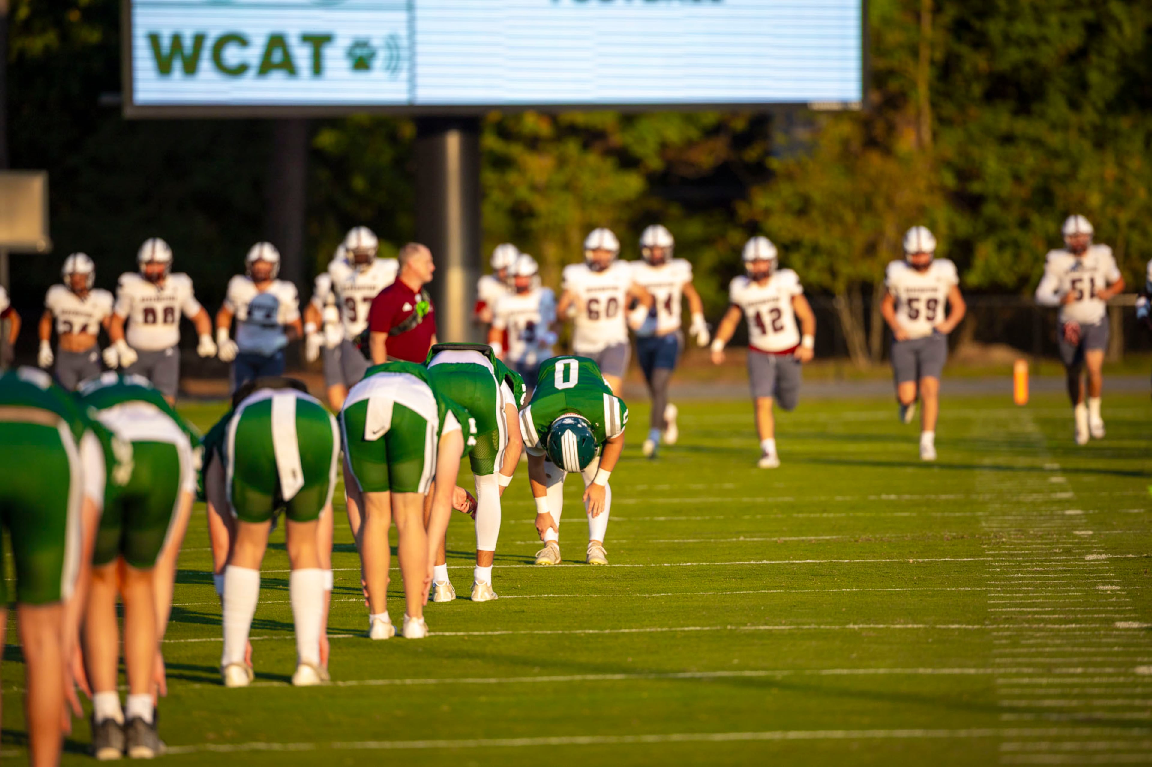 Westminster plaayers warm up in a matchup against Benedictine at Fritz Orr Field in Atlanta, GA on Friday, Sept. 19th, 2025. (Oscar Guevara Saenz for the AJC)