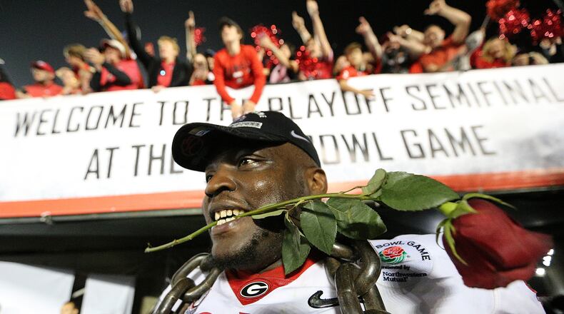 Georgia defender John Atkins celebrates beating Oklahoma 54-48 during double over time in the College Football Playoff Semifinal at the Rose Bowl Game on Monday, January 1, 2018, in Pasadena, Calif.
