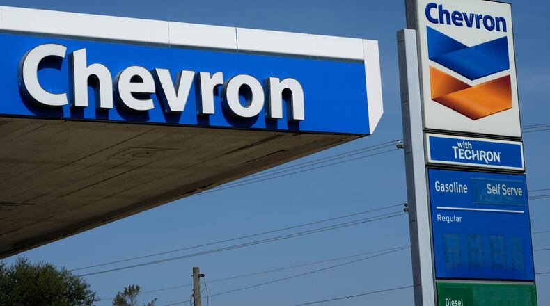 FILE - Chevron logos are displayed at a gas station in Columbus, Miss., Monday, Oct. 23, 2023.(AP Photo/Rogelio V. Solis, File)