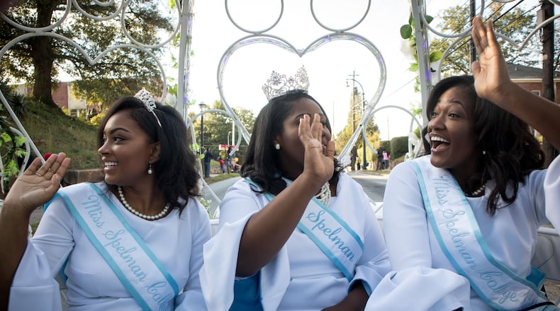 Miss Spelman Janna LeAnn Perry (C) and her two Attendants Zaire Bailey (R) and Haleigh Renèe Hoskins (L) ride in a carriage during the combined homecoming parade of Clark Atlanta University, Morehouse College and Spelman College in Atlanta GA October 21, 2017. STEVE SCHAEFER / SPECIAL TO THE AJC