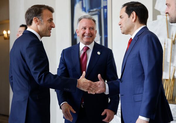 French President Emmanuel Macron, left, welcomes US Special Envoy Steve Witkoff, center, and US Secretary of State Marco Rubio for a meeting at the Elysee Palace in Paris, Thursday April 17, 2025. (Ludovic Marin, Pool Photo via AP)