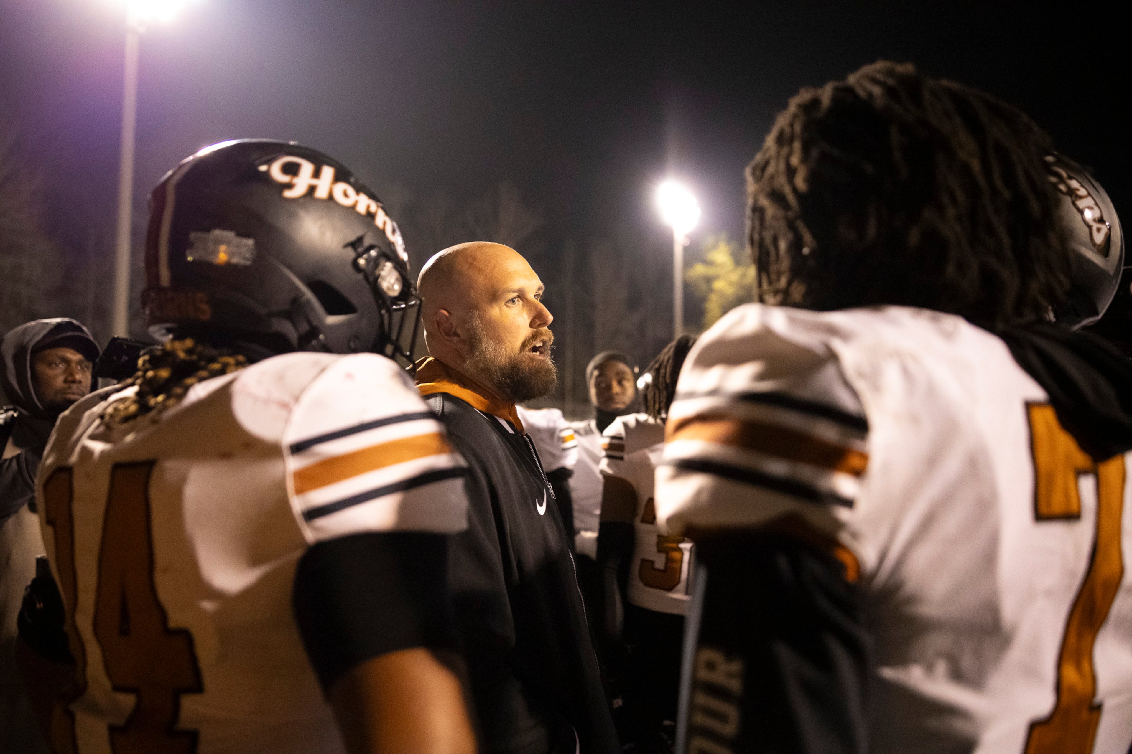 Kell head coach Bobby May motivates his players after a hard-fought loss in the class 4A semifinal against Creekside at Creekside High School in Fairburn, GA on Friday, December 5, 2025. (Oscar Guevara Saenz for the AJC)