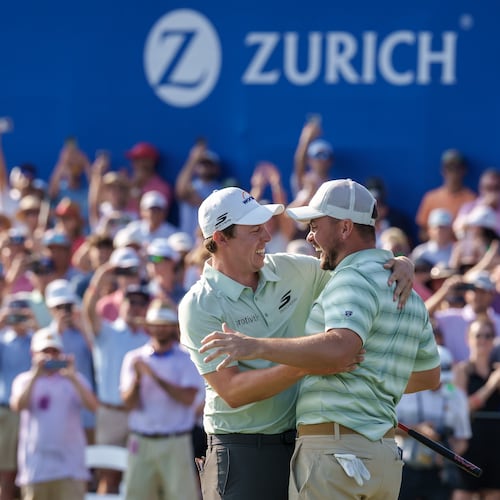 Alex Fitzpatrick, right, of England, reacts after sinking a birdie putt and winning the tournament with his brother Matt Fitzpatrick, left, during the final round of the PGA Zurich Classic of New Orleans golf tournament, Sunday, April 26, 2026, in Avondale, La. (AP Photo/Matthew Hinton)