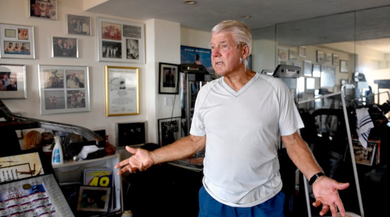 Former Miami Dolphins and University of Miami football coach Jimmy Johnson stands in his memorabilia room, stunned, on September 14, 2017, in Tavernier, Fla., after Hurricane Irma destroyed the home. (Taimy Alvarez/Sun Sentinel/TNS)