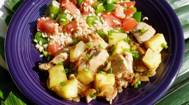 Chicken with rum and pineapple. (Linda Gassenheimer/TNS)