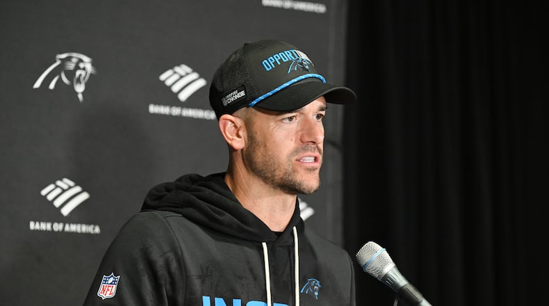 Carolina Panthers head coach Dave Canales answers questions after an NFL football game against the Tampa Bay Buccaneers Saturday, Jan. 3, 2026, in Tampa, Fla. (AP Photo/Jason Behnken)