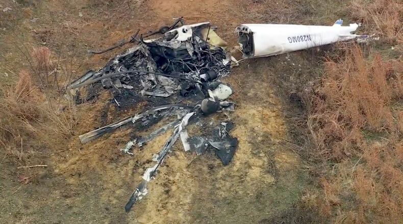 Debris from a helicopter is shown after two helicopters crashed in Hammonton, N.J., on Sunday, Dec. 28, 2025. (WPVI-TV/6ABC via AP)
