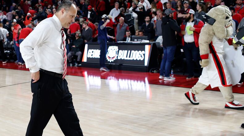 FILE - In this Feb. 28, 2018, file photo, Georgia coach Mark Fox leaves the court after the team's loss to Texas A&M in an NCAA college basketball game in Athens, Ga. Fox has been fired following a disappointing regular season and the team's loss to Kentucky in the quarterfinals of the Southeastern Conference tournament. Athletic director Greg McGarity announced the decision in a statement released by the school on Saturday, March 10. (Joshua L Jones/Athens Banner-Herald via AP, File)