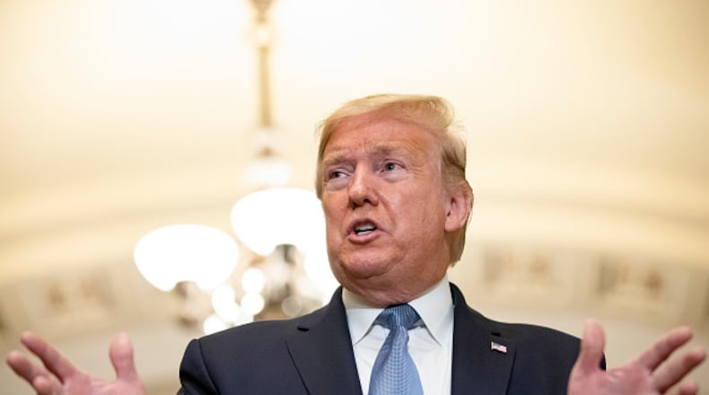 WASHINGTON, DC - MARCH 10: U.S. President Donald Trump talks to reporters at the Capitol after attending the Senate Republicans weekly policy luncheon on March 10, 2020 in Washington, DC. (Photo by Samuel Corum/Getty Images)