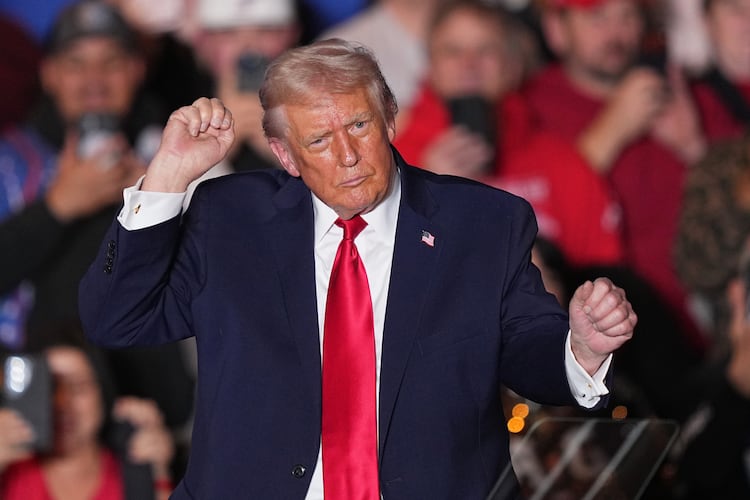 President Donald Trump dances to music after speaking at the Mount Airy Casino Resort in Mount Pocono, Pa., Tuesday, Dec. 9, 2025. (Matt Rourke/AP)