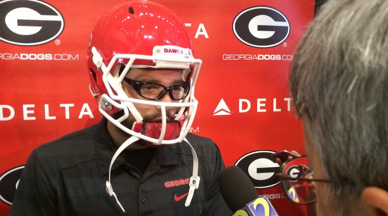 Georgia kicker Rodrigo Blankenship meets the media Wednesday, uniquely attired. (Staff photo/Steve Hummer