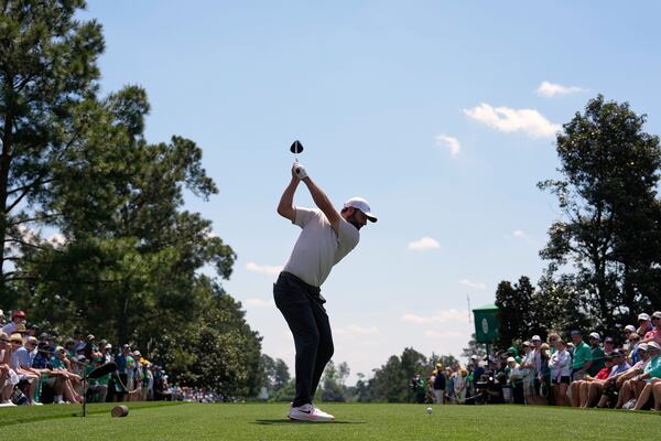Scottie Scheffler hits his tee shot on the ninth hole during the first round at the Masters golf tournament, Thursday, April 10, 2025, in Augusta, Ga. (AP Photo/Ashley Landis)