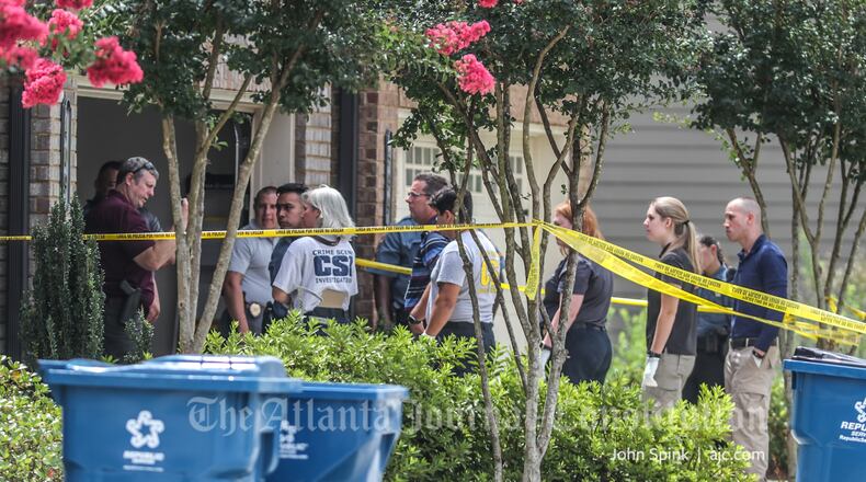 Gwinnett County homicide detectives were called to the scene Monday afternoon on Braemore Mill Drive.