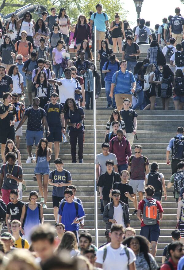 Georgia Tech students walk to and from class on the first day of the 2017-18 semester in August 2017. The school has more than 30,000 students. A recent data breach may have exposed some of their personal data. JOHN SPINK / JSPINK@AJC.COM