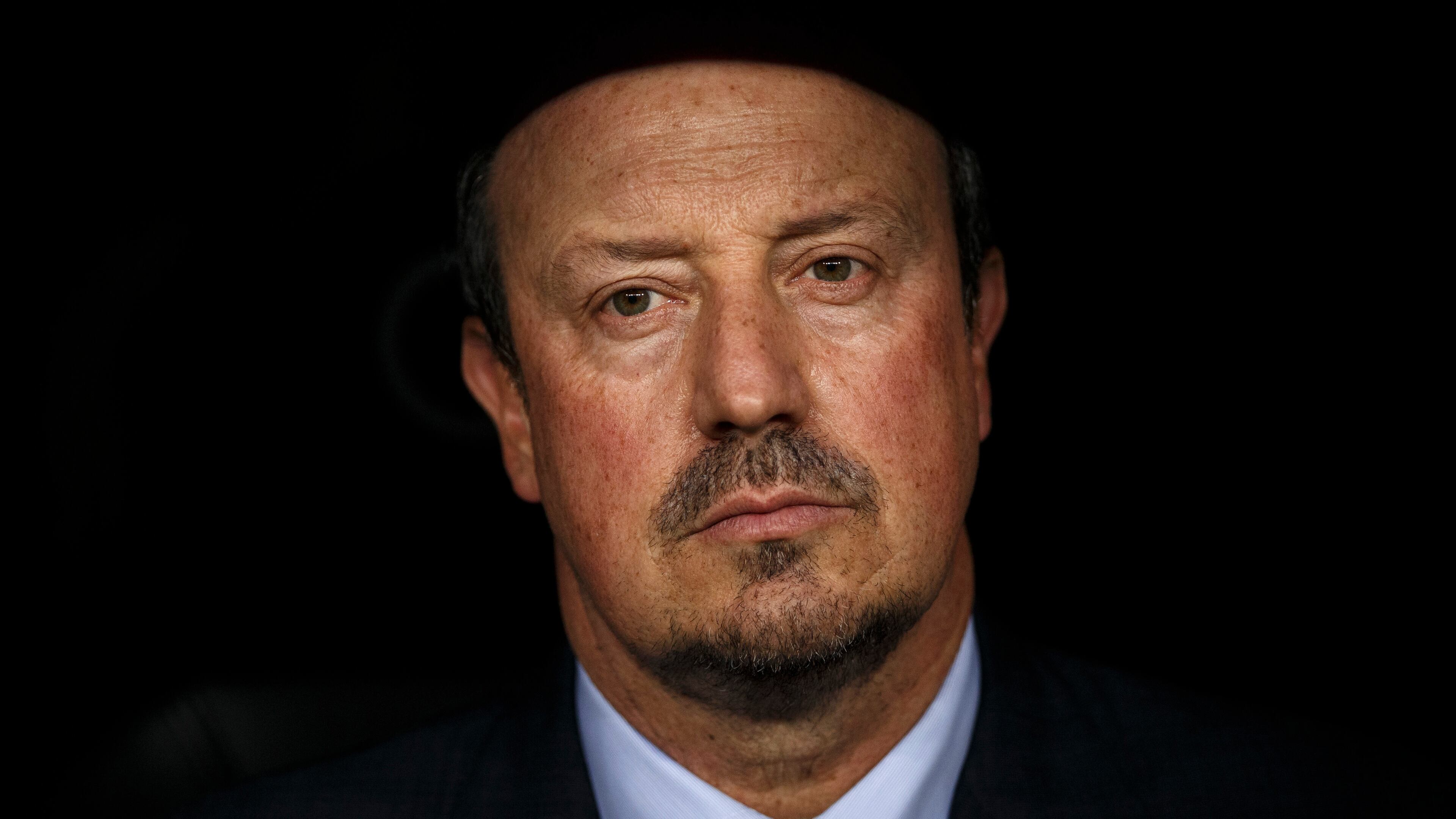 FILE -Real Madrid's head coach Rafa Benitez sits on the bench moments before the Santiago Bernabeu trophy soccer match between Real Madrid and Galatasaray at the Santiago Bernabeu stadium, in Madrid, Aug. 18, 2015. (AP Photo/Daniel Ochoa de Olza, File)