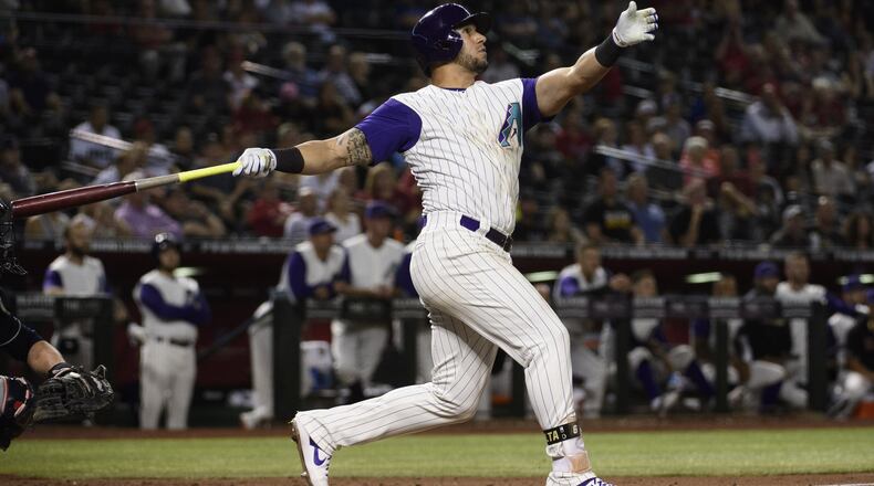 David Peralta of the Arizona Diamondbacks hits a solo home run in the ninth inning against the Atlanta Braves at Chase Field on May 9, 2019 in Phoenix