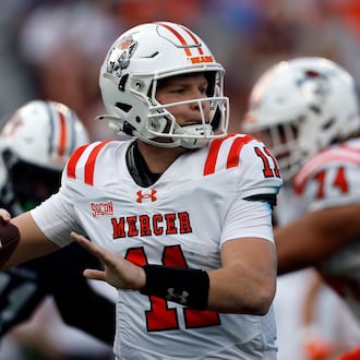 Mercer quarterback Braden Atkinson throws a pass during the first half of an NCAA college football game against Auburn, Saturday, Nov. 22, 2025, in Auburn, Ala. (Butch Dill/AP)