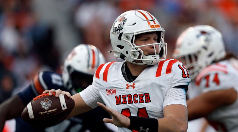 Mercer quarterback Braden Atkinson throws a pass during the first half of an NCAA college football game against Auburn, Saturday, Nov. 22, 2025, in Auburn, Ala. (Butch Dill/AP)