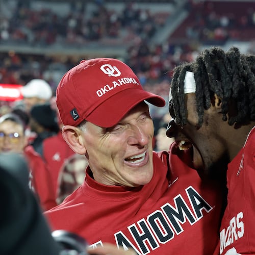 Oklahoma head coach Brent Venables celebrates with linebacker Kip Lewis (10) after defeating LSU during an NCAA college football game Saturday, Nov. 29, 2025, in Norman, Okla. (AP Photo/Alonzo Adams)