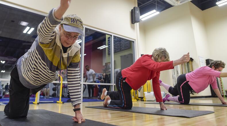 Cancer survivors from left, Dana Hadley, Beverly Tobey and Dina Moerschbacher stay in shape during recovery with a fitness program run by cancer exercise specialist Jeff Rheault and instructor Jessica Tax with the nonprofit Triumph Foundation at California Family Fitness on Wednesday, February 15, 2017 in Sacramento, Calif. (Manny Crisostomo/The Sacramento Bee/TNS)