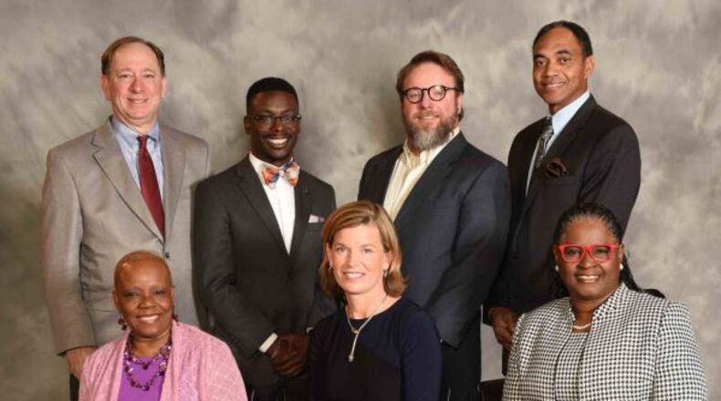 Members of the DeKalb County Board of Education (standing from left) include Chairman Marshall Orson, Diijon DaCosta, Stan Jester, Michael Erwin (seated from left) Joyce Morley, Allyson Gevertz and Vice-Chairwoman Vickie B. Turner. (Photo Courtesy DeKalb County School District)