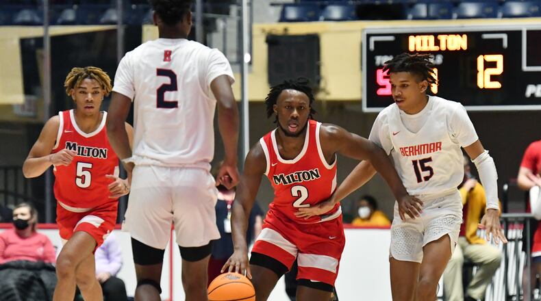 March 13, 2021 Macon - Milton's Bruce Thornton (2) brings the ball upcourt during the 2021 GHSA State Basketball Class AAAAAAA Boys Championship game at the Macon Centreplex in Macon on Saturday, March 13, 2021 Milton won 52-47 over Berkmar. (Hyosub Shin / Hyosub.Shin@ajc.com)