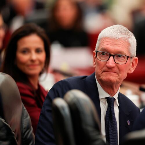 Apple CEO Tim Cook attends a meeting between Chinese Premier Li Qiang and U.S. business representatives, at the Great Hall of the People in Beijing, Thursday, May 14, 2026. (Go Nakamura/Pool Photo via AP)