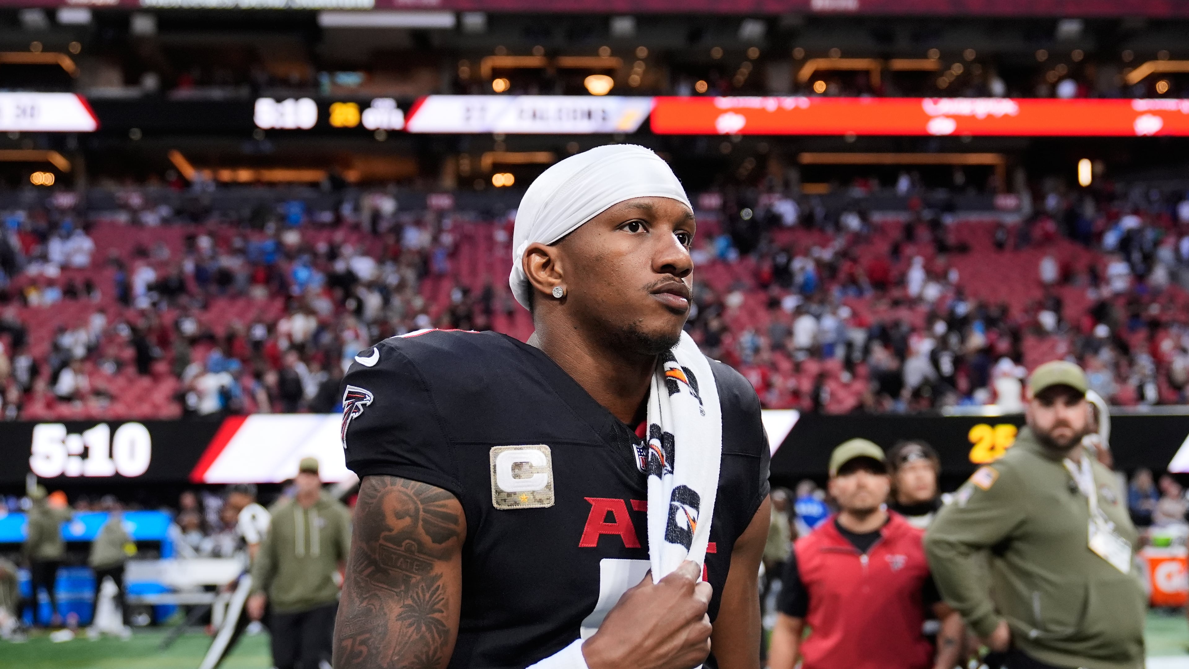 Atlanta Falcons quarterback Michael Penix Jr. (9) walks of the field after overtime of an NFL football game against the Carolina Panthers, Sunday, Nov. 16, 2025, in Atlanta. (AP Photo/Brynn Anderson)