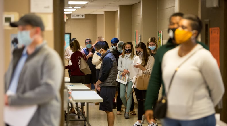 Voters wait to cast their ballots at Lynwood Recreation Center in Brookhaven on the last day of Early voting. PHIL SKINNER FOR THE ATANTA JOURNAL-CONSTITUTION