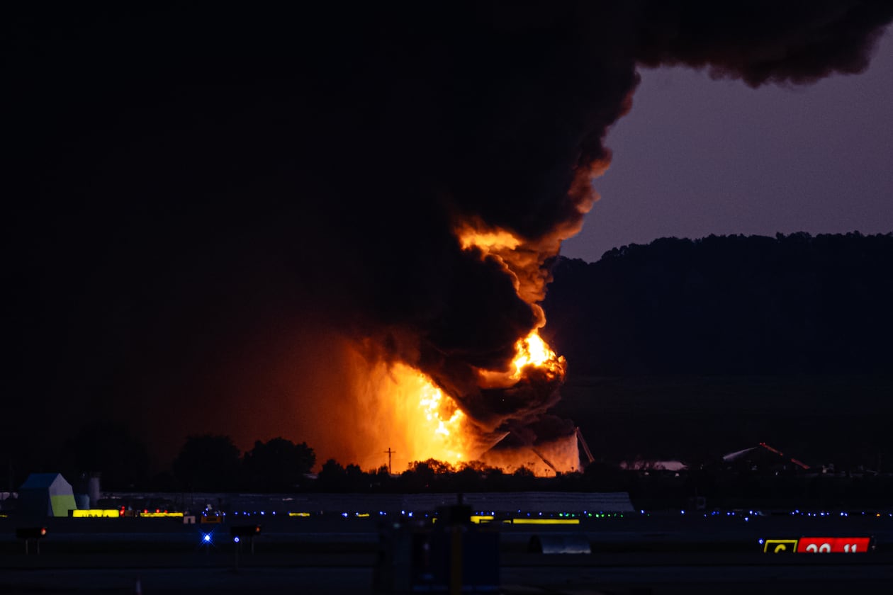 A fireball erupts near airport property after reports of a UPS plane crash at Louisville International Airport, Tuesday, Nov. 4, 2025, in Louisville, Ky. (Jon Cherry/AP)