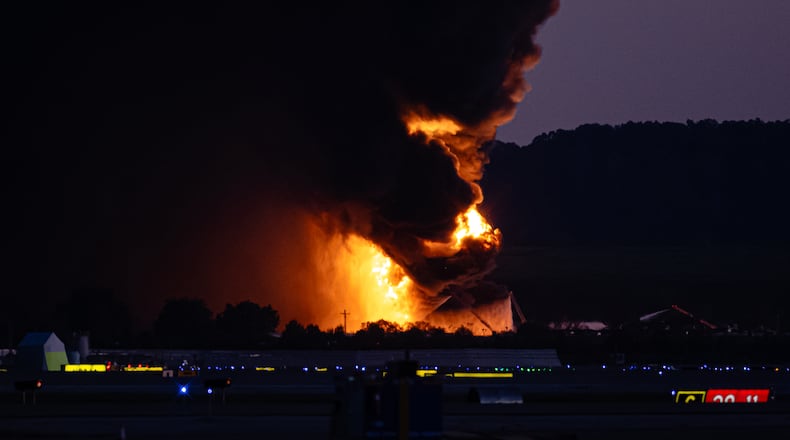 A fireball erupts near airport property after reports of a UPS plane crash at Louisville International Airport, Tuesday, Nov. 4, 2025, in Louisville, Ky. (Jon Cherry/AP)