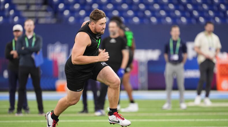 Georgia offensive lineman Monroe Freeling runs a drill at the NFL combine in Indianapolis on Sunday, March 1, 2026. Freeling's workout likely increased his NFL draft stock. (Michael Conroy/AP)