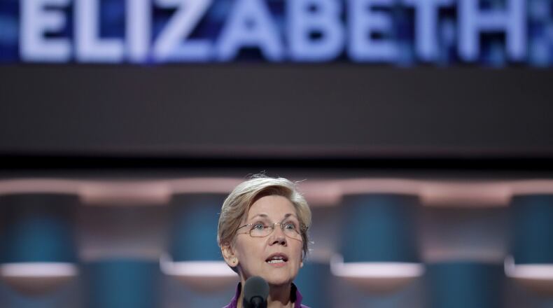 Sen. Elizabeth Warren (D-MA) stands on stage prior to the start of the first day of the Democratic National Convention at the Wells Fargo Center, July 25, 2016 in Philadelphia, Pennsylvania. An estimated 50,000 people are expected in Philadelphia, including hundreds of protesters and members of the media. The four-day Democratic National Convention kicked off July 25. (Photo by Chip Somodevilla/Getty Images)