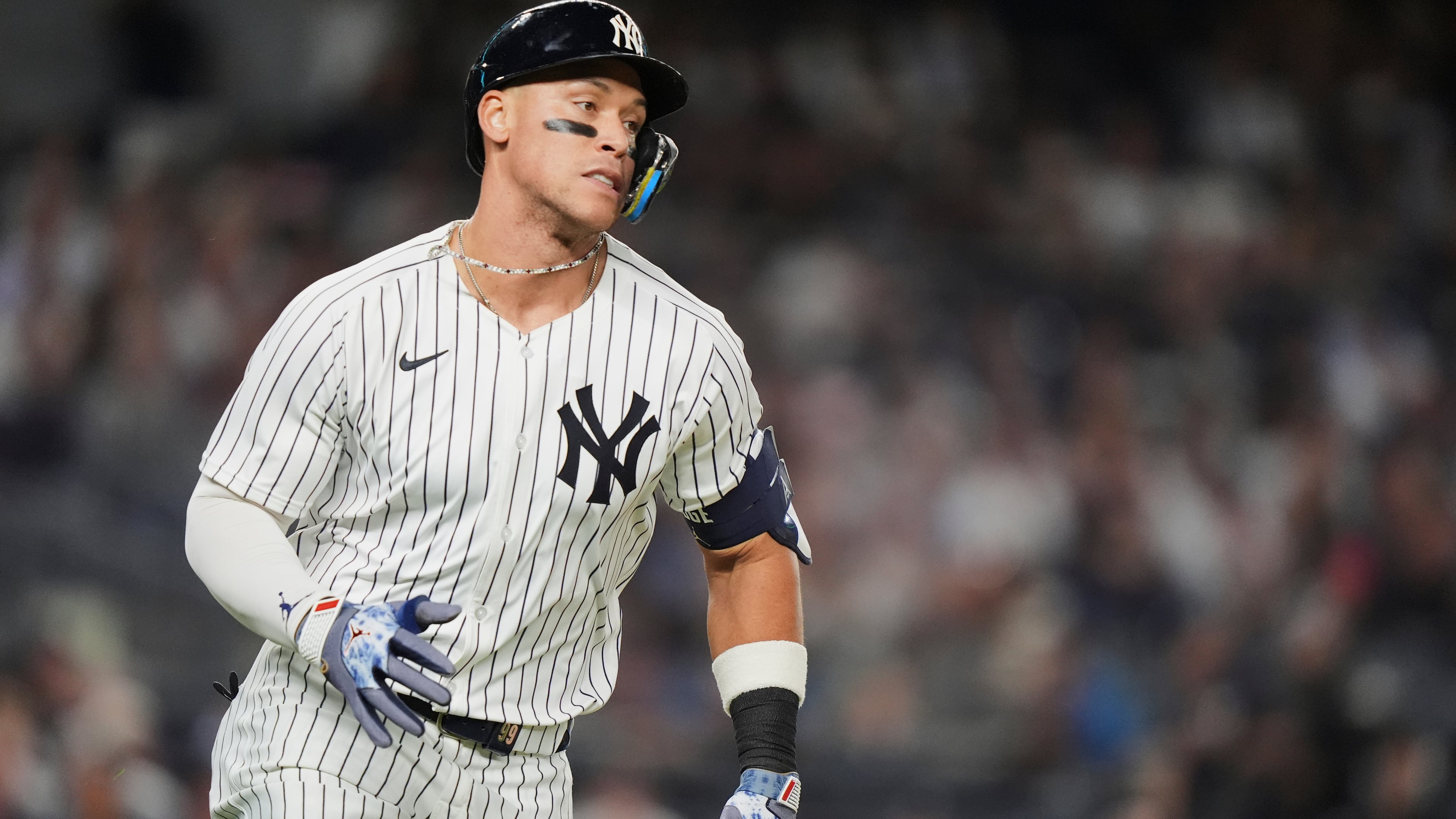 New York Yankees' Aaron Judge runs to first base for a single during the sixth inning of a baseball game against the Detroit Tigers Thursday, Sept. 11, 2025, in New York. (AP Photo/Frank Franklin II)