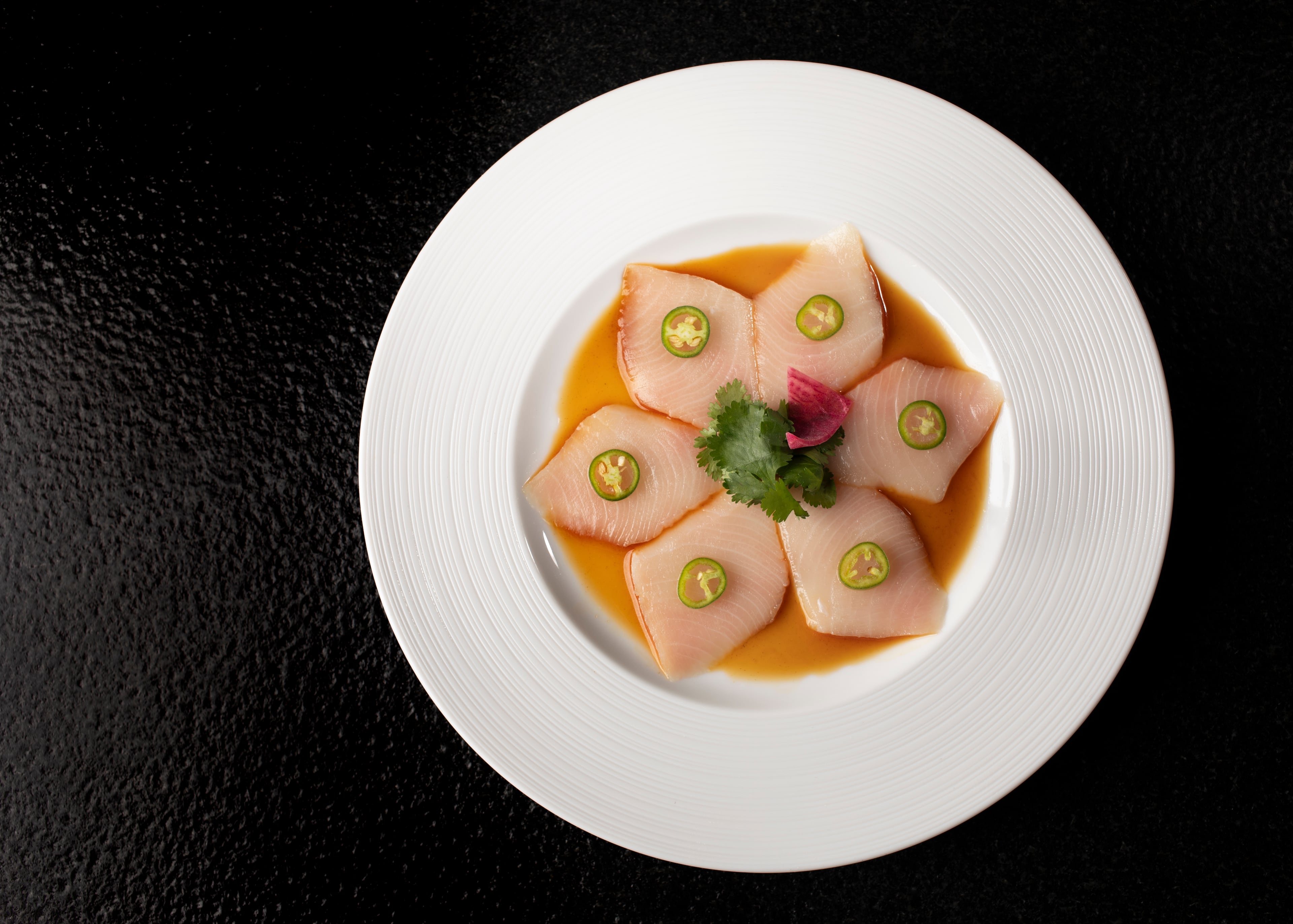 Umi's extensive menu has been known to convert new sushi lovers. (Courtesy of Lara Kastner/Umi)