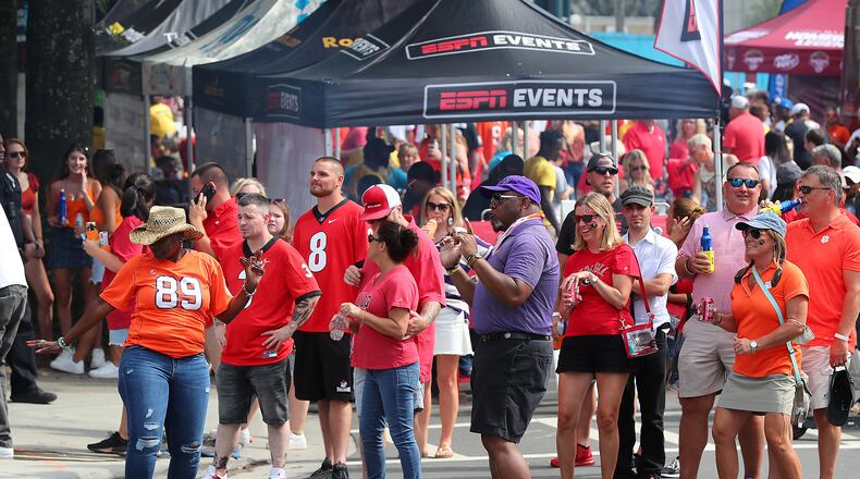 Georgia and Clemson fans fill the streets outside Bank of America Stadium as the teams prepare to play in a NCAA college football game on Saturday, Sept 4, 2021, in Charlotte. “Curtis Compton / Curtis.Compton@ajc.com”