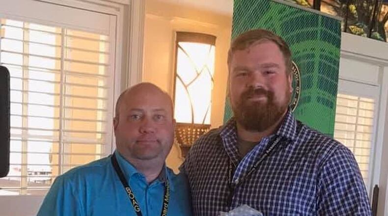 The Building Officials Association of Georgia recently honored City of Woodstock Senior Building Inspector Jake Hill with the 2019 Georgia Inspector of the Year Award. Pictured: (left) Josh Roth, President of the Building Officials Association of Georgia, and (right) Jake Hill, Senior Building Inspector of City of Woodstock.