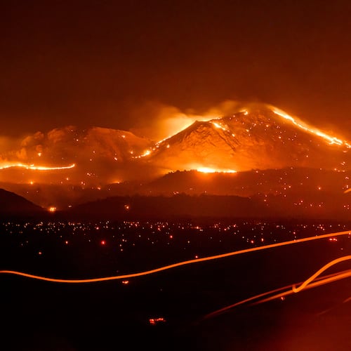 FILE - The Bug Fire burns near Doyle in unincorporated Lassen County, Calif., Aug. 13, 2026. (AP Photo/Noah Berger, File)