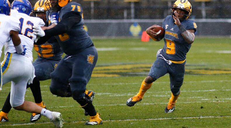 Kennesaw State running back Shaquil Terry (9) runs the ball during the first half of an FCS quarterfinal college football game between Kennesaw State and South Dakota State at Fifth Third Bank Stadium in Kennesaw, Ga., on Saturday, Dec. 8, 2018. (Casey Sykes for The Atlanta Journal-Constitution)
