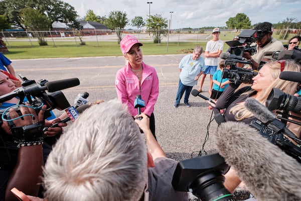 Savannah Chrisley, daughter of reality television star Todd Chrisley, speaks outside the Federal Prison Camp, Wednesday, in Pensacola, Florida. (Dan Anderson/AP)