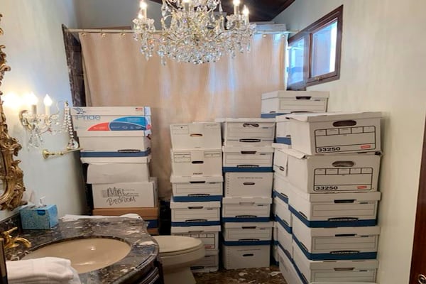 This image, contained in the indictment against former President Donald Trump, shows boxes of records stored in a bathroom and shower in the Lake Room at Trump's Mar-a-Lago estate in Palm Beach, Fla. (Justice Department via AP)