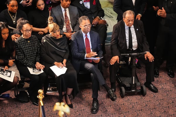 Andrew Young (from right) joined Jesse Jackson Jr., Santita Jackson and others inside the South Carolina Statehouse as the Rev. Jesse Jackson lies in state. (Matt Kelley, Pool/AP)