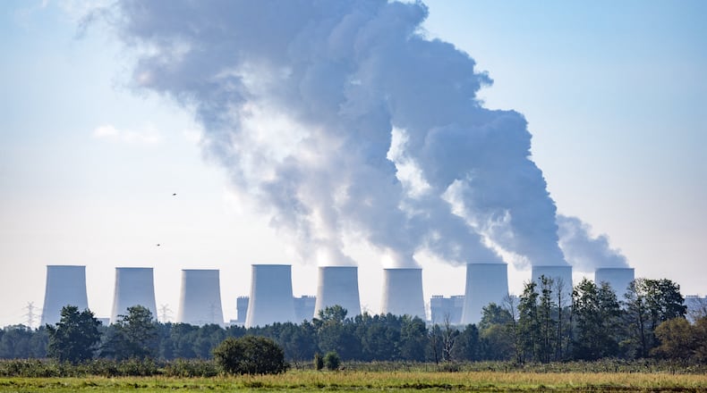 Water vapor rises from the cooling towers at the Jänschwalde power plant in Turnow-Preilack, Germany, Wednesday, Sept. 2, 2026. (Frank Hammerschmidt/dpa via AP)