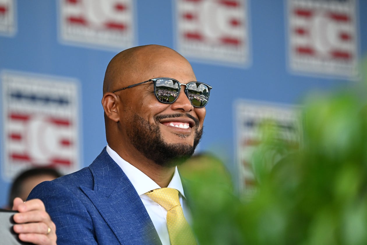 Andruw Jones smiles as he sits with other members of the National Baseball Hall of Fame during the 2026 National Baseball Hall of Fame induction ceremony at the Clark Sports Center on Sunday, July 26, 2026, in Cooperstown, N.Y. (Hyosub Shin/AJC)