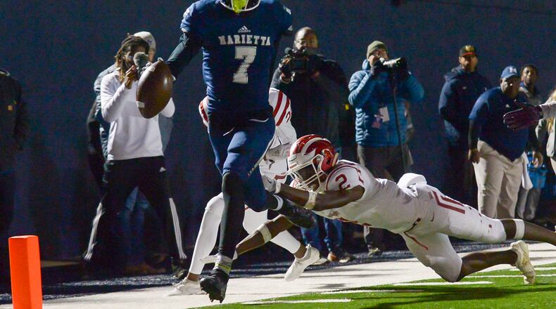Marietta wide receiver Ricky White (7) scores a touchdown in a 2019 game. White was among 24 former Georgia high school football players taken in the 2025 NFL draft April 24-26. The former first-team all-state player and member of Marietta's 2019 state championship team went in the seventh round to the Seahawks.(Daniel Varnado/Special)