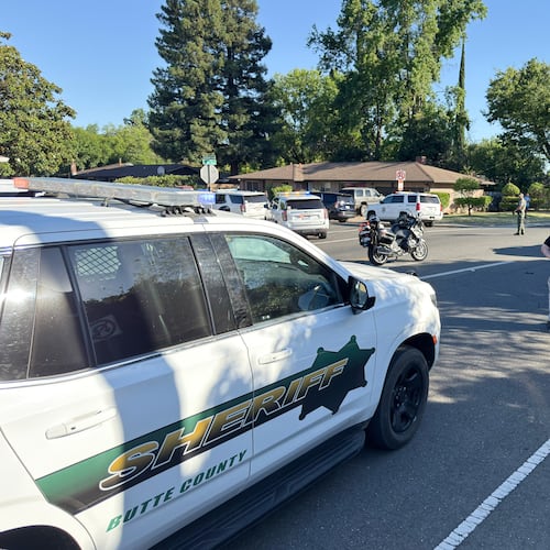 Law enforcement personnel block East First Avenue between Sherman Avenue and Sheridan Avenue following a shooting at the Chico Library, Monday, June 22, 2026 in Chico, Calif. (Michael Weber/The Chico Enterprise-Record via AP)